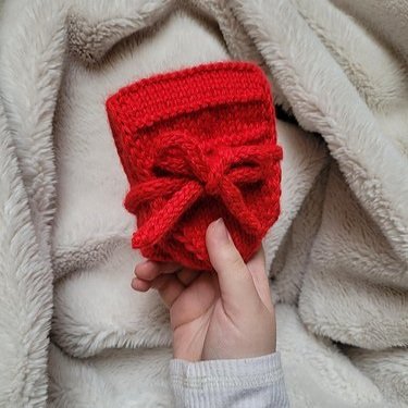 A red hand knit gift for the holidays