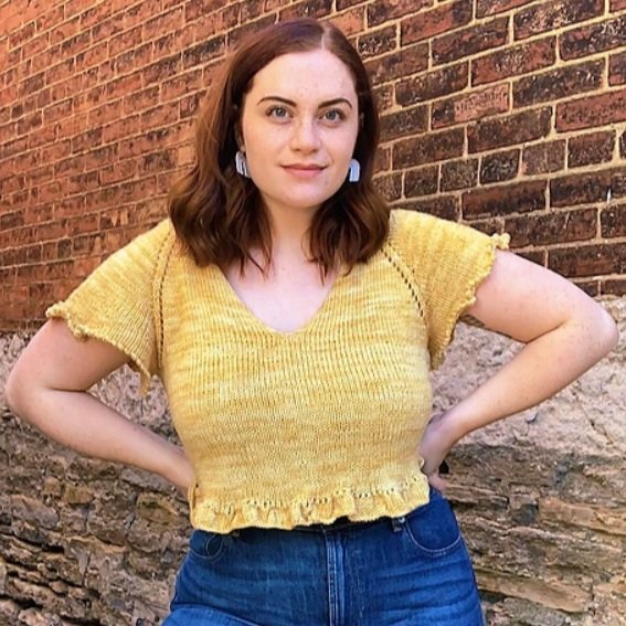 A woman wearing a yellow Brookline Blouse pattern by Mezzo Makes