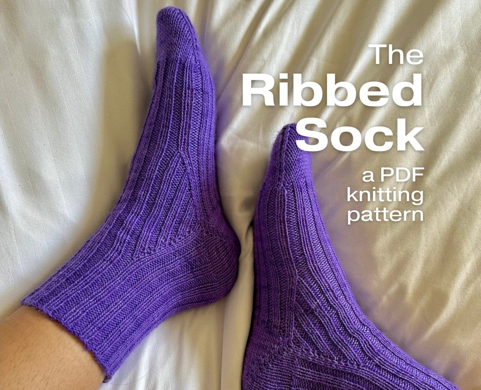 Ribbed sock knitting pattern PDF featuring a purple knitted sock, showcasing step-by-step guidance for creating stylish, cozy socks. 